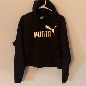 Black and gold cropped hoodie.